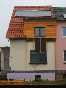 Haussanierung mit Holzbekleidung